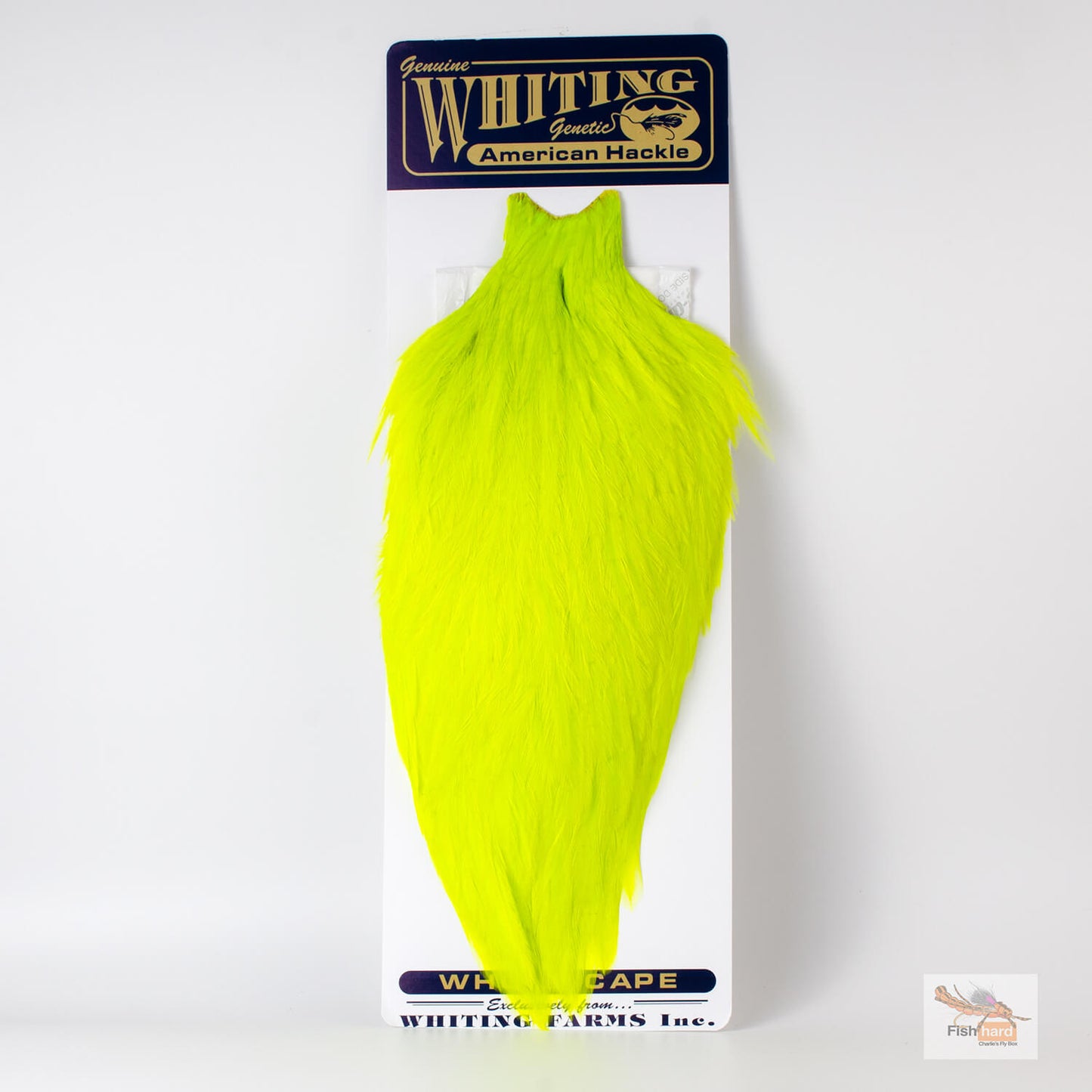 A neon yellow-green feather hackle , mounted on its original white and navy blue card packaging. The packaging features the text 'Genuine Whiting Fishes American Hackle' and 'Whiting Cape' by Whiting Farms Inc.