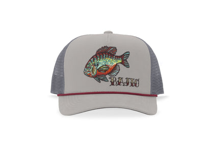 Gray trucker hat with a Bluegill fish design, red rope, and 'Bajio' text on a white background