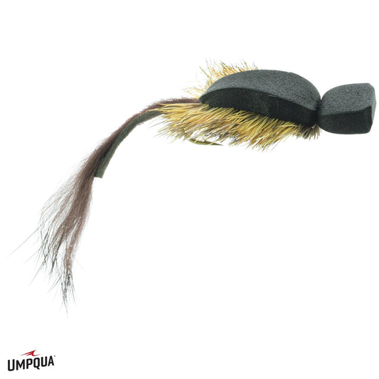 A Umpqua brand fishing fly lure with a black foam body, golden-brown hackle feathers, and a dark brown tail, shown on a plain white background.